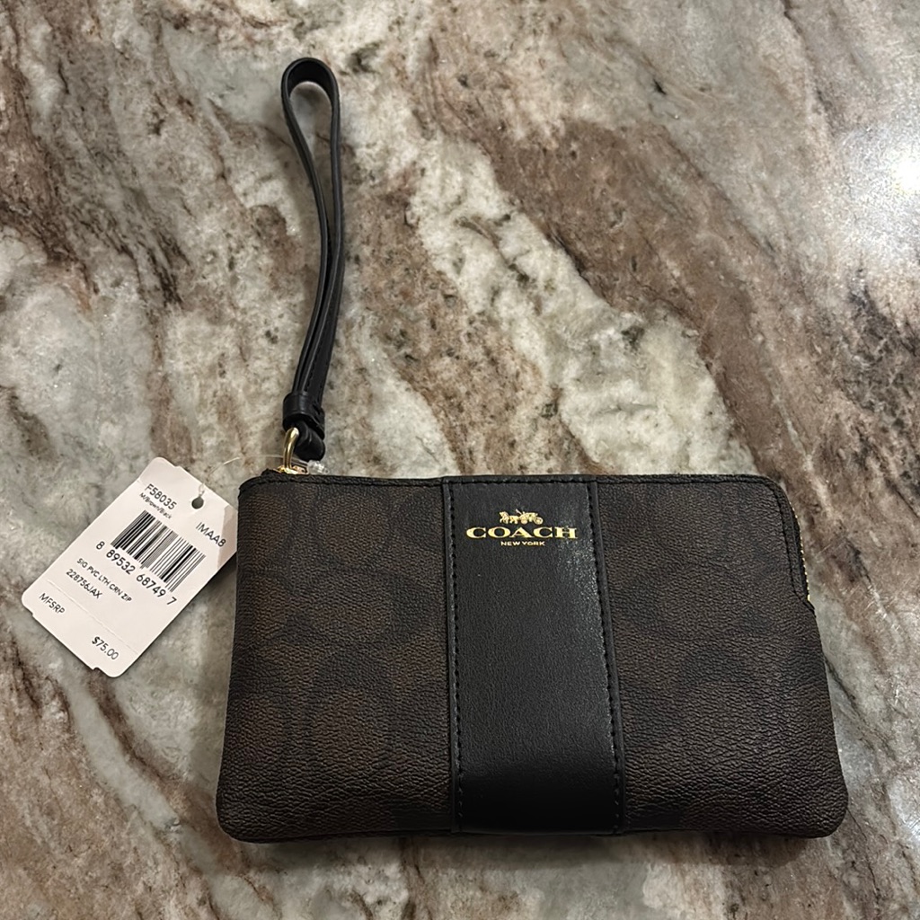 Coach Brown Signature Wristlet With Black Center Stripe And Gold Logo